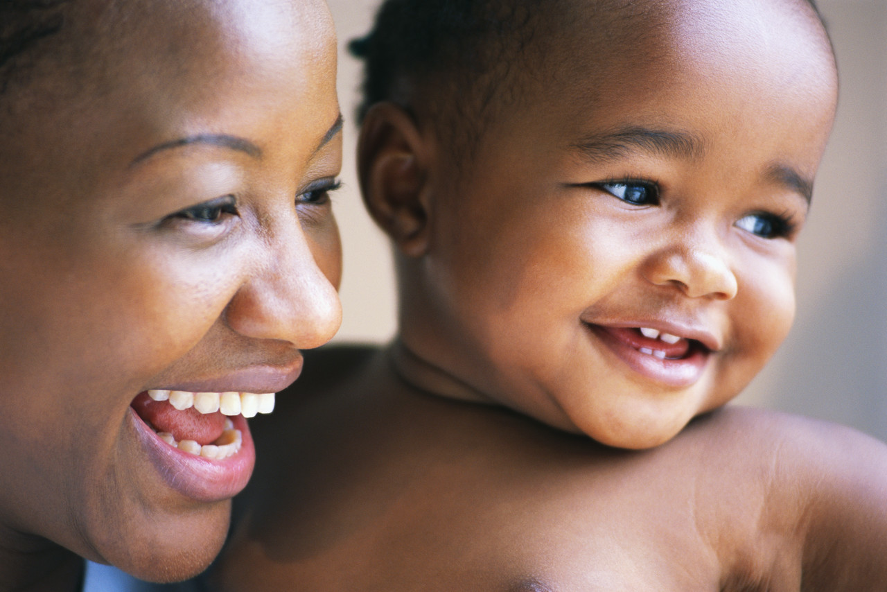 Smiling Mother and Toddler Smiling Mother and Toddler